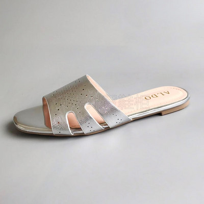 Ženske papuče od umjetne kože s ravnim potplatom