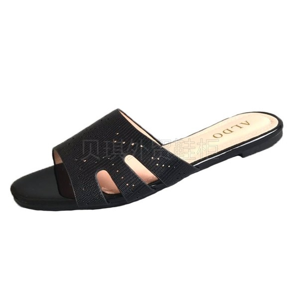 Ženske papuče od umjetne kože s ravnim potplatom