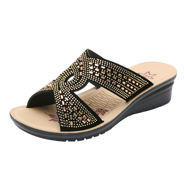 Γυναικείες παντόφλες με χιαστί τιράντες και διακοσμητικές πέτρες