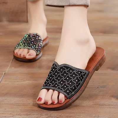 Uus mudel ökonahast dekoratiivkivide ja lameda tallaga naiste sussid