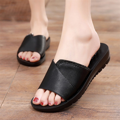 Uus mudel ökonahast dekoratiivkivide ja lameda tallaga naiste sussid