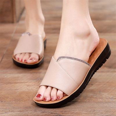 Uus mudel ökonahast dekoratiivkivide ja lameda tallaga naiste sussid