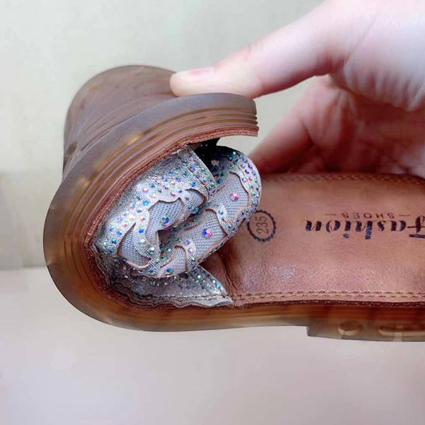 Uus mudel ökonahast dekoratiivkivide ja lameda tallaga naiste sussid