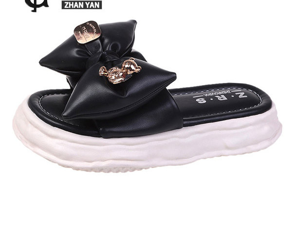 Volüümika paela ja dekoratiivsete elementidega naiste sussid