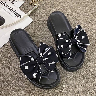 Ženske papuče s tekstilnom trakom