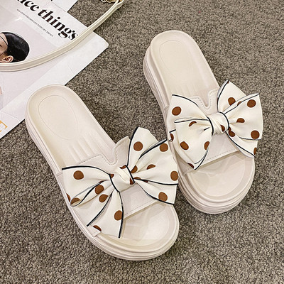 Ženske papuče s tekstilnom trakom