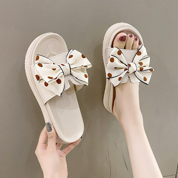 Ženske papuče s tekstilnom trakom