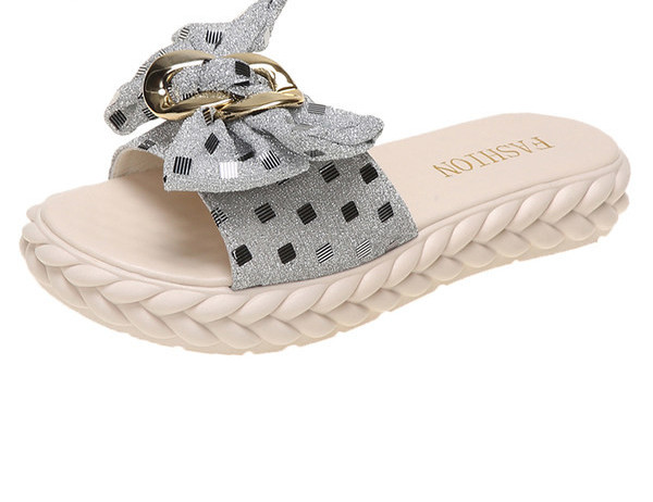 Ženske papuče s ravnim potplatom, trakom i metalnim elementom