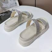 Naiste kõrge talla ja dekoratiivkividega sussid