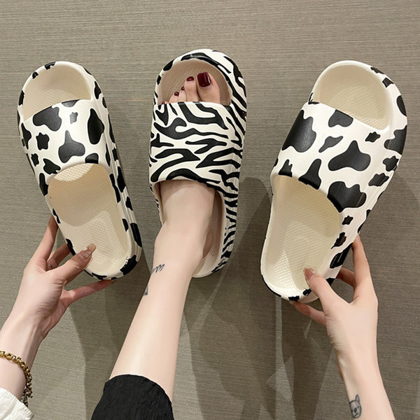 Naiste loomamustriga kummisussid