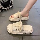 Ležerne papuče s ravnim potplatom i vezicama