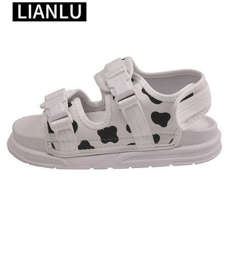 Ženske sandale od tekstila sa plastičnim kopčama