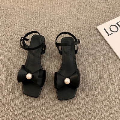 Moodsad naiste sandaalid paela ja pärliga