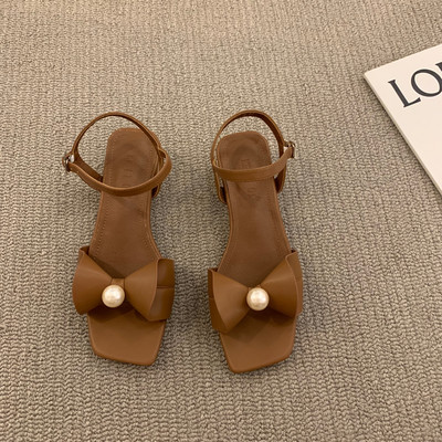 Moodsad naiste sandaalid paela ja pärliga