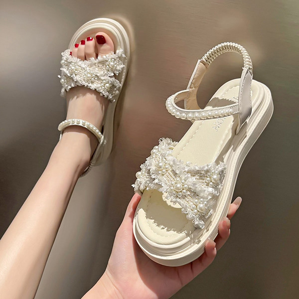 Ristirihmade ja pärlitega naiste sandaalid
