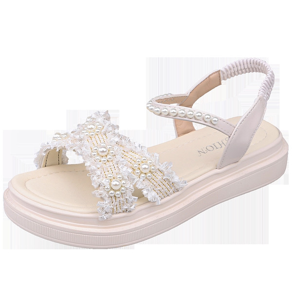 Ristirihmade ja pärlitega naiste sandaalid