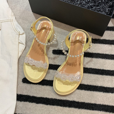 Moodsad naiste sandaalid kivide ja pärlitega