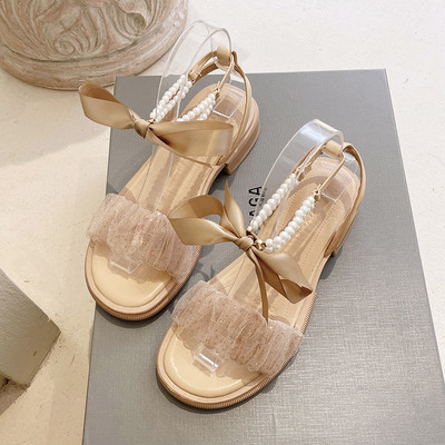 Moodsad naiste sandaalid pärlite ja paelaga