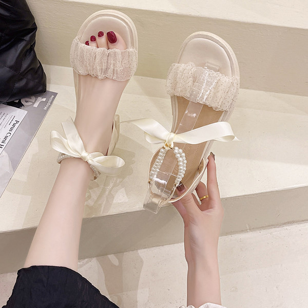 Moodsad naiste sandaalid pärlite ja paelaga