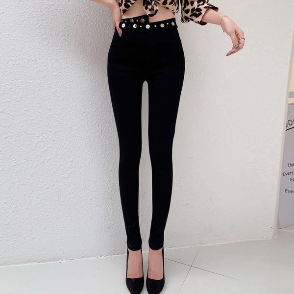 Moodsad kõrge vöökoha ja metallelemendiga naiste retuusid