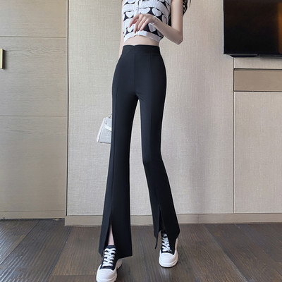 Naiste stiilsed kõrge vöökoha ja lõhikutega retuusid säärtel