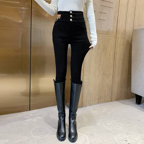 Naiste soliidsed nööpide ja dekoratiivse ketiga retuusid