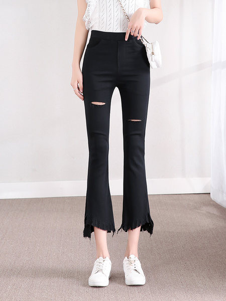 Naiste kõrge vöökoha ja rebenenud motiividega retuusid