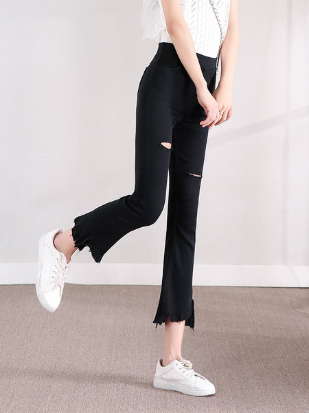 Naiste kõrge vöökoha ja rebenenud motiividega retuusid