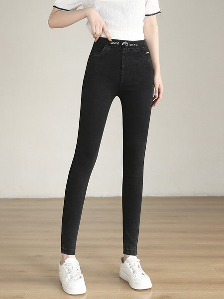 Naiste elastsed retuusid kõrge vöökoha ja tikitud tekstiga