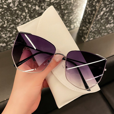 Μοντέρνα γυναικεία γυαλιά ηλίου με μεταλλικό λεπτό σκελετό