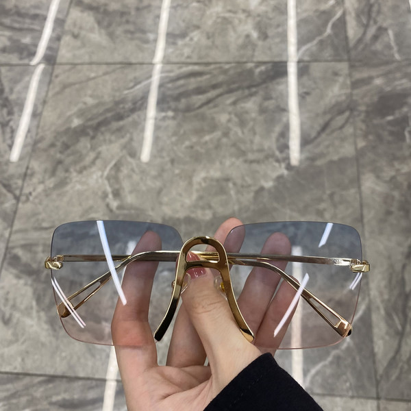 Naiste kandilised õhukeste raamidega prillid uus mudel