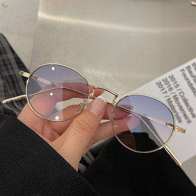 Mitmes värvitoonis õhukese raamiga ümarad naiste prillid