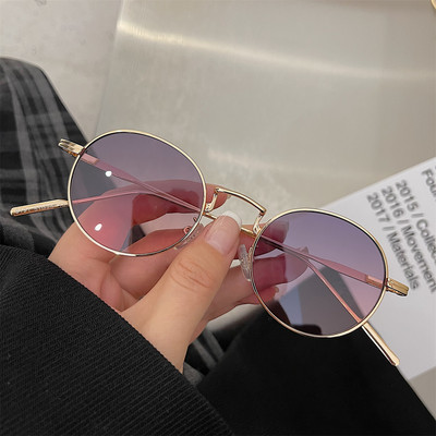 Mitmes värvitoonis õhukese raamiga ümarad naiste prillid