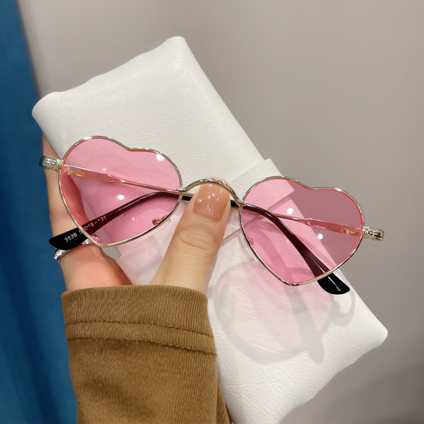 Naiste moodsad mitmes värvitoonis südamekujulised prillid