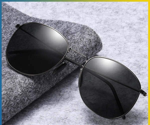 Ovaalse kuju ja õhukeste raamidega meeste päikeseprillid