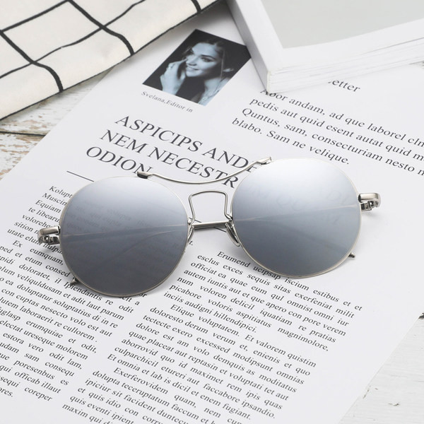 Μοντέρνα unisex γυαλιά ηλίου σε στρογγυλό σχήμα με λεπτό σκελετό