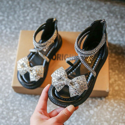 Vaikiškos basutės su blizgaus efekto kaspinu