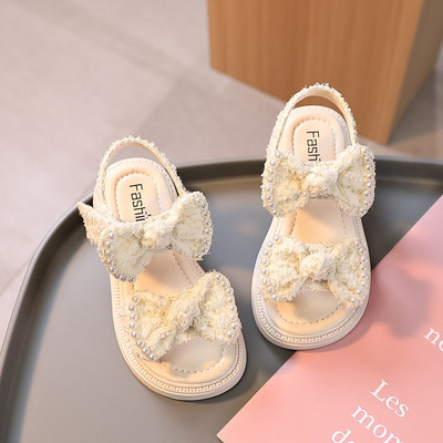 Vaikiškos basutės su kaspinėliais ir perlais