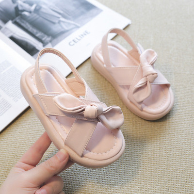 Сандали за момиче с кръстосани каишки и панделка