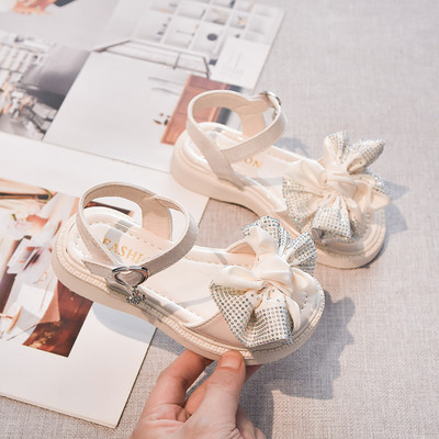 Сандали за момиче с текстилна панделка и декоративни камъни