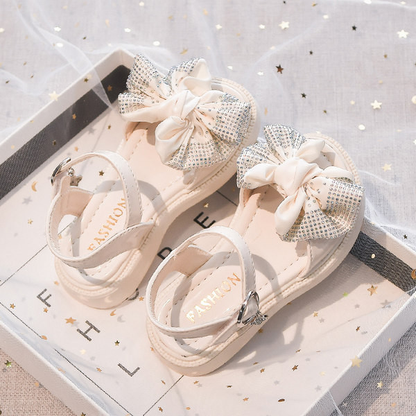 Сандали за момиче с текстилна панделка и декоративни камъни