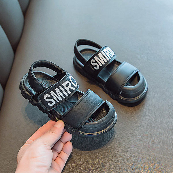 Dječje sandale s kožnim remenčićima i natpisom