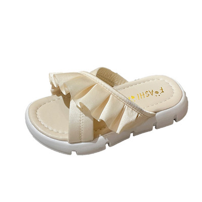 Gyermek papucs textil pántokkal és fürtökkel