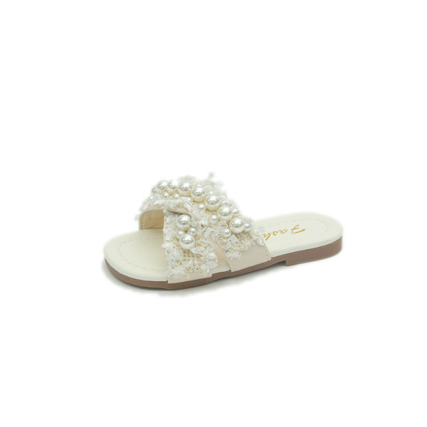 Must-valged pärlitega laste sussid