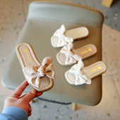 Laste kunstnahast paelaga sussid