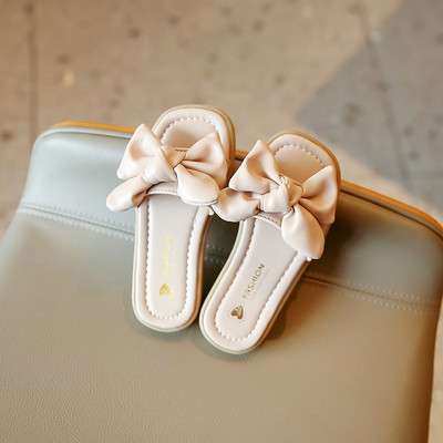 Laste kunstnahast paelaga sussid