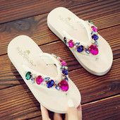 Laste värviliste kivikestega sussid