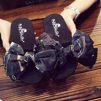 Papuče za djevojčice s velikom tekstilnom trakom