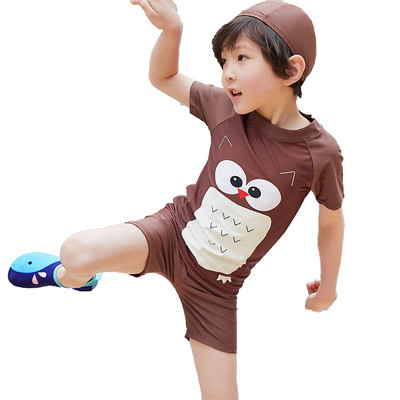 Pruuni värvi ja aplikatsiooniga laste täisujumistrikoo