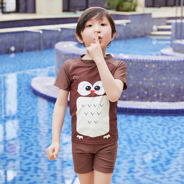 Pruuni värvi ja aplikatsiooniga laste täisujumistrikoo